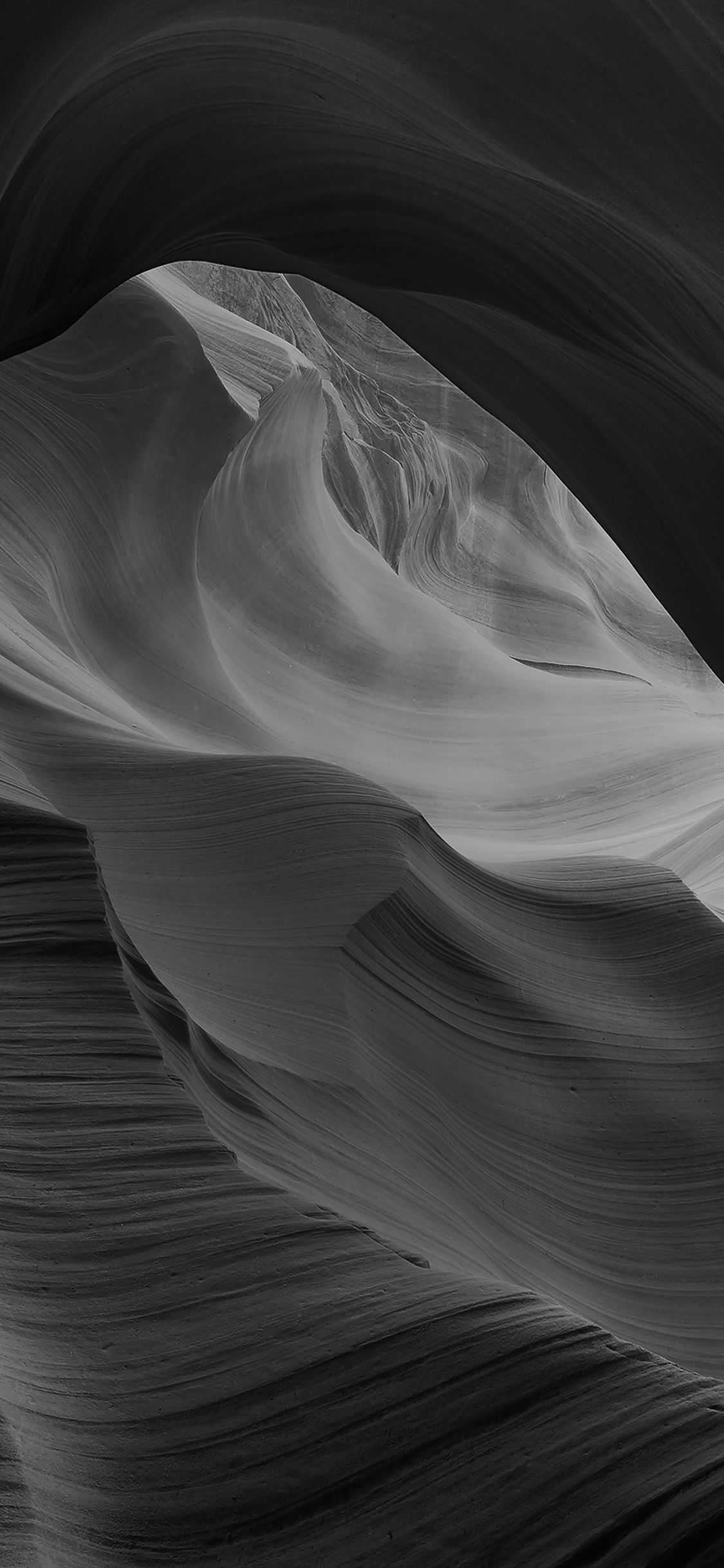 1125x2436 mi29-antelope-canyon-bw-black-mountain-rock-nature Wallpaper