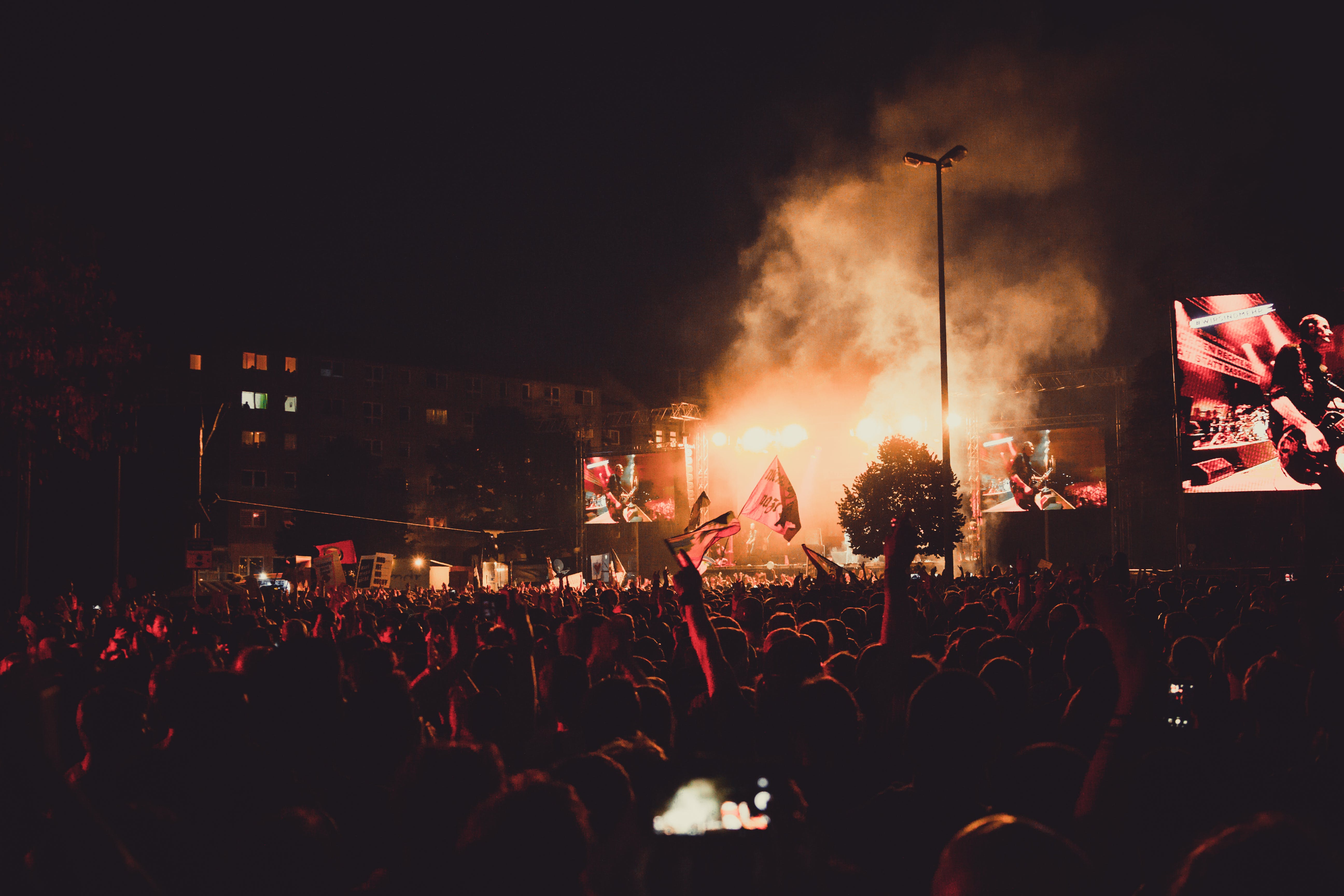 5184x3456 Band Performing On Smoky Stage In Front Of People During - Rock ... Wallpaper