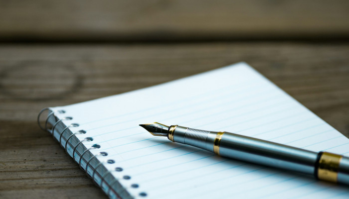 Notebook and Pen Wallpaper