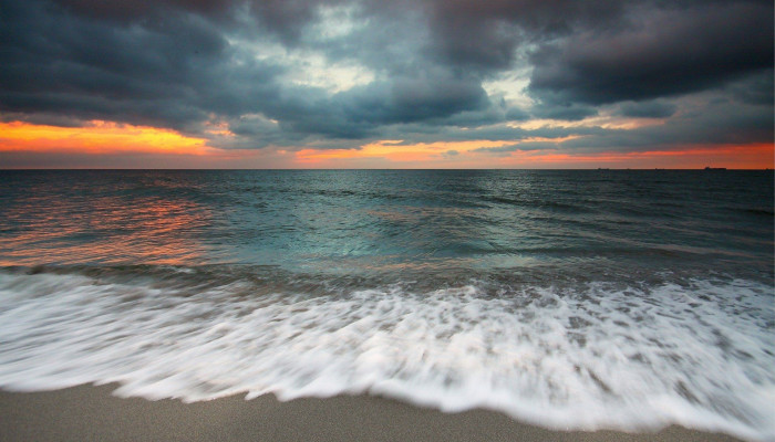 Cloudy Beach Wallpaper